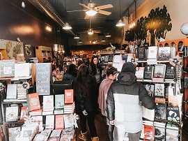 Customers browsing at Curious Iguana in Frederick, Maryland. 